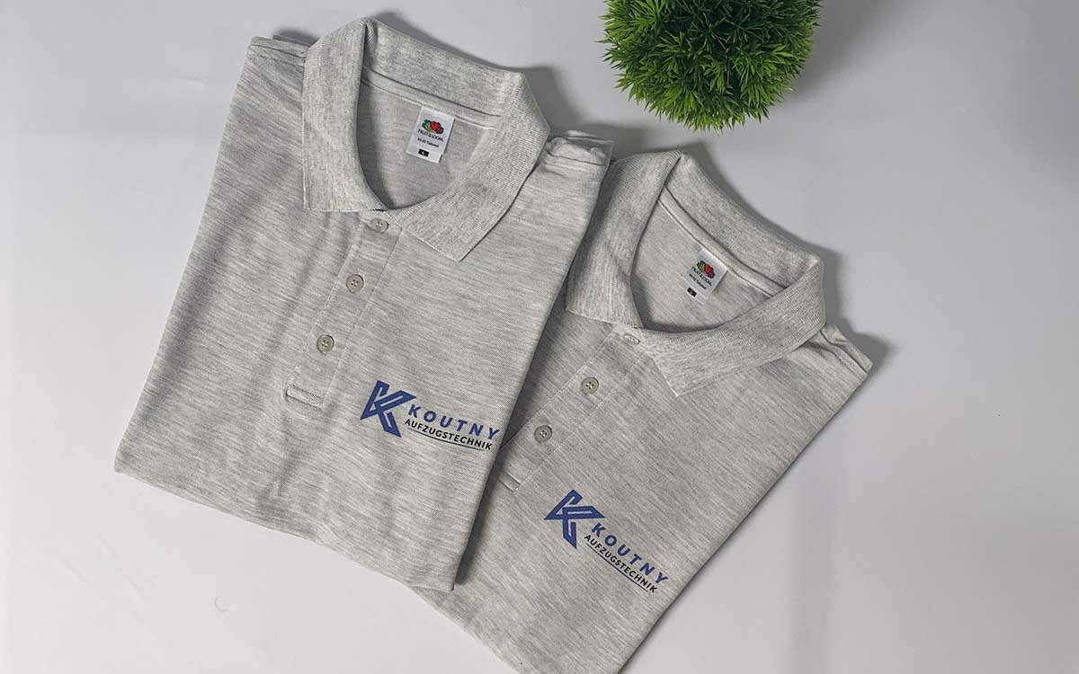 Poloshirt grau mit Kountny Logo bedruckt